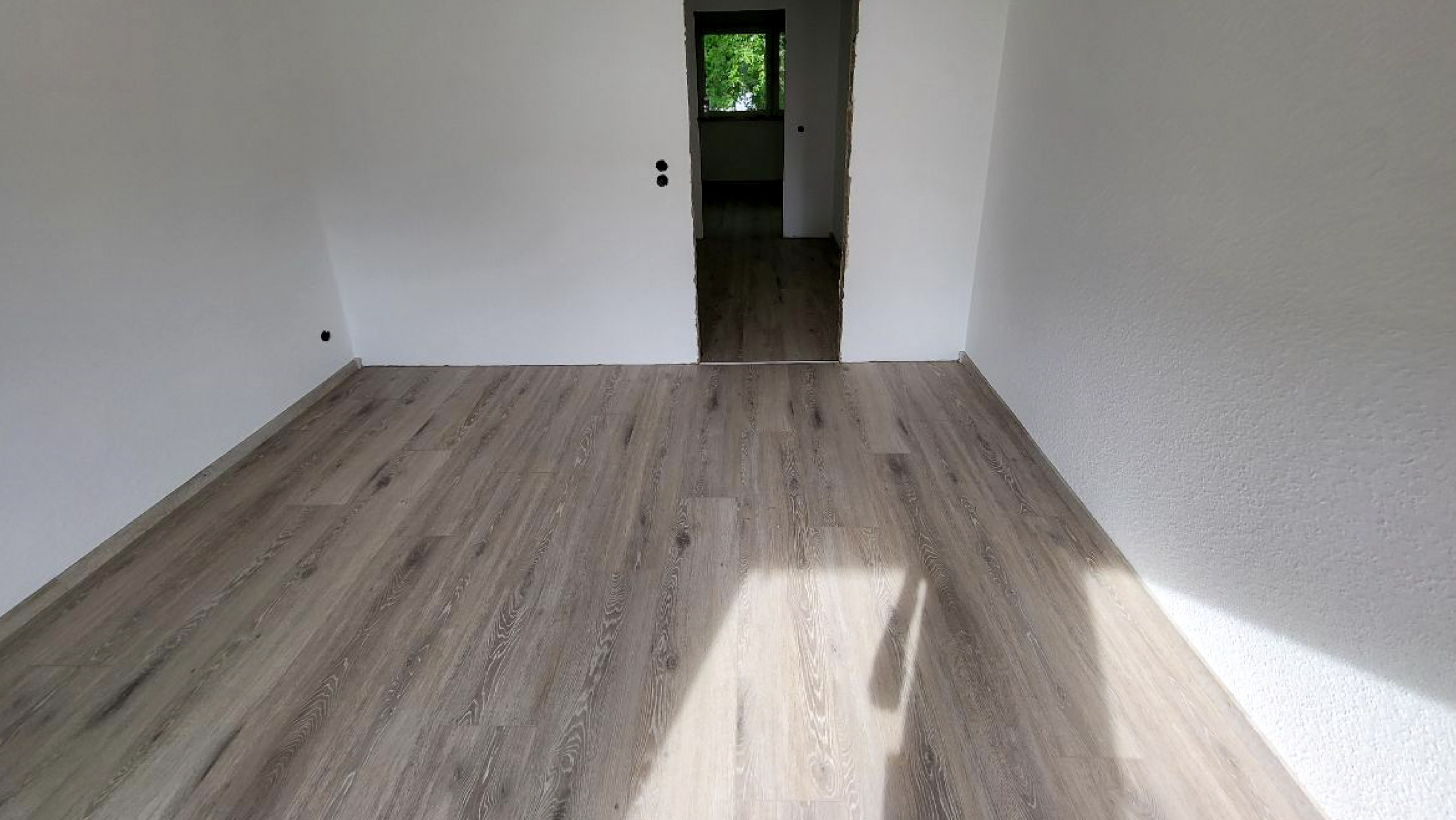 Referenz: Klick-Laminat in Eichenoptik | HolzLand Beese in Unna
